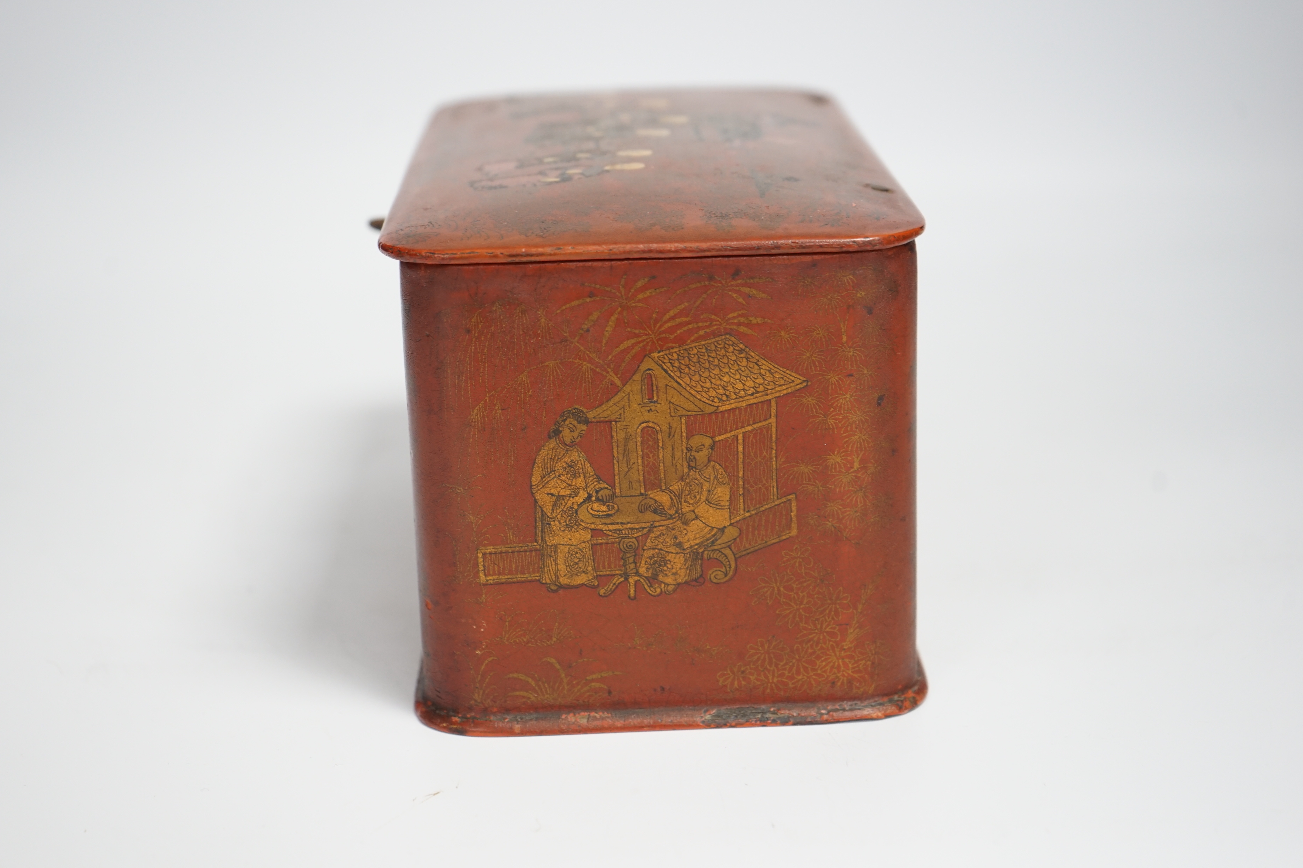 A 19th century French red japanned chinoiserie tea caddy, 11cm high